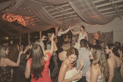Guests dancing at Jen and Lawrence's wedding reception